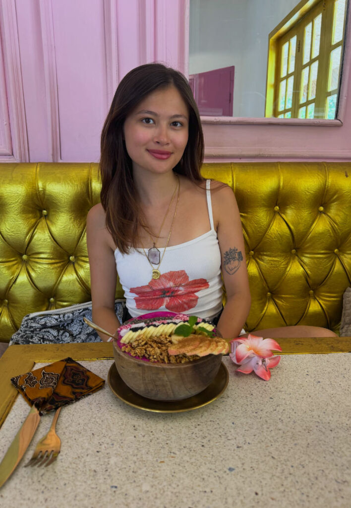 Melissa enjoying the dragon fruit bowl at Gili Bliss.